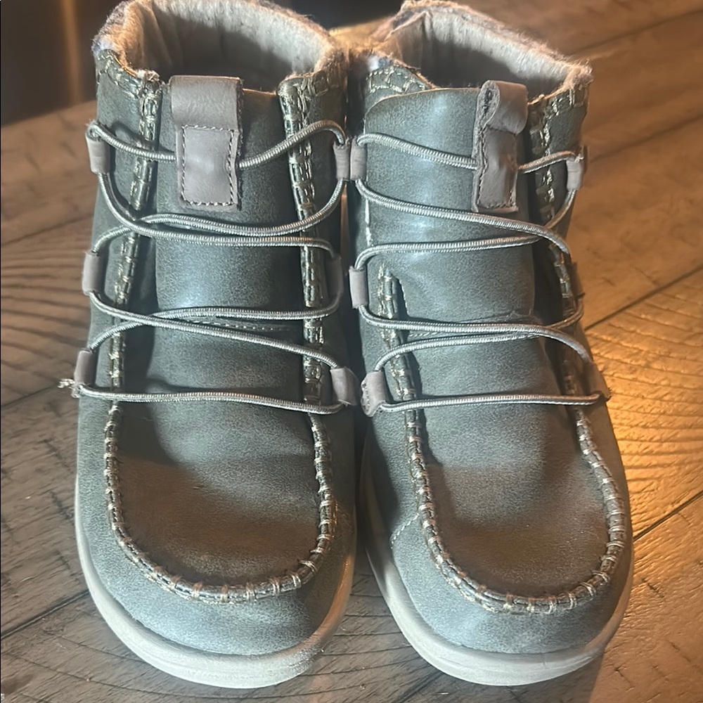 Woman’s brown  Boots